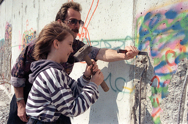 Fall of the Wall - People hacking away Berlin Wall