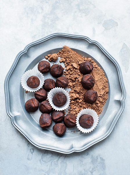 Chocolate truffles on vintage metal plate