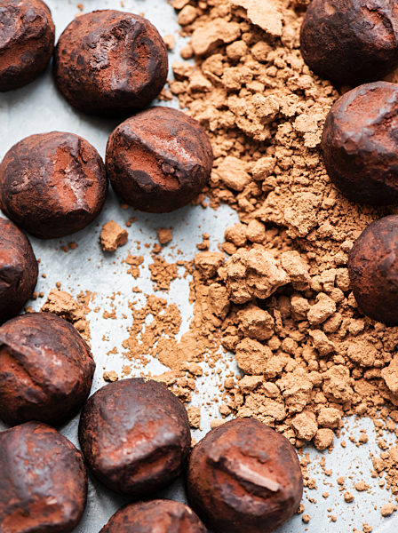 Chocolate truffles and cocoa powder