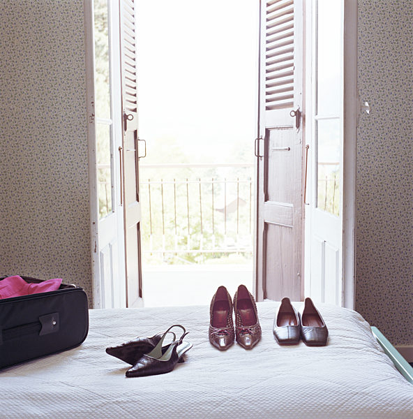 Shoes and doorway to villa