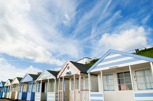 Beach huts under blue sky