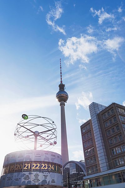 Germany, Berlin, Urania world clock and Berlin TV tower at Alexanderplatz