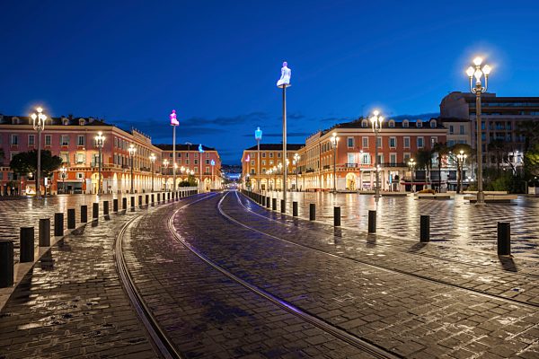 France, Provence-Alpes-Cote d'Azur, Nice, tramway on Place Massena at blue hour
