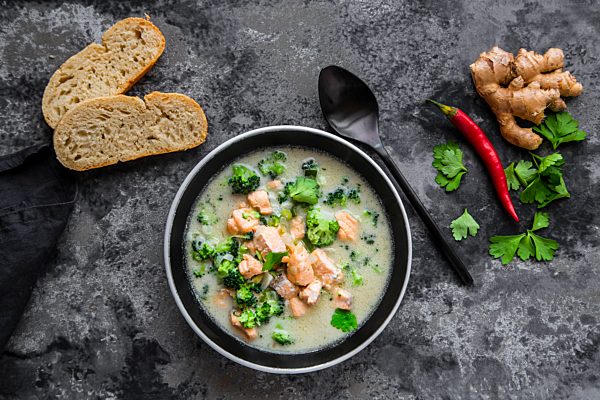 Cocos salmon soup, with broccoli, leek, coconut milk, parsley, chili pod, ginger and baguette