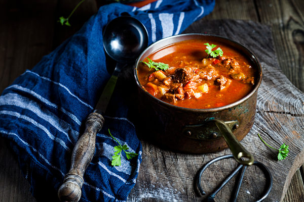 Goulash soup with flat leaf parsley