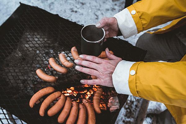 Close-up of woman having a winter barbecue
