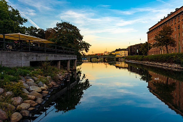 Residential buildings and Sodra Forstadskanalen in city during sunset