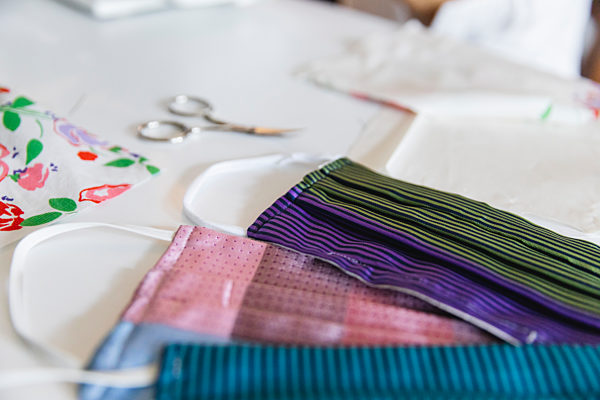 Close-up of colorful homemade face masks on table at home