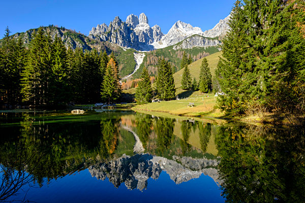 Scenic view of Lake Alm with Grosse Bischofsmutze and Oberhofalm mountains in background