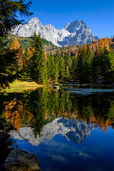 Scenic view of Lake Alm with Oberhofalm mountain in background