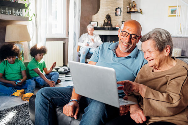 Multi-ethnic family spending leisure time at home