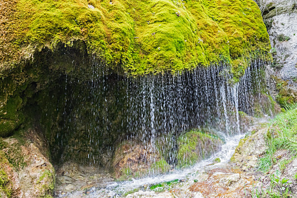 Dreimuhlen waterfall falling down mossy slope