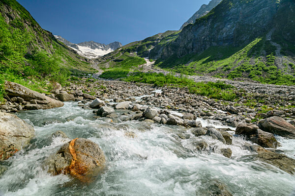 Clear mountain stream in Zillertal Alps
