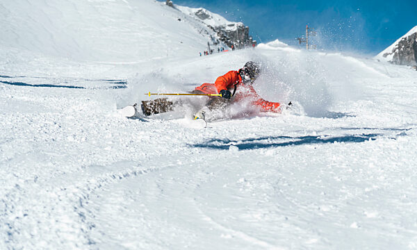 Man skiing on snow covered mountain