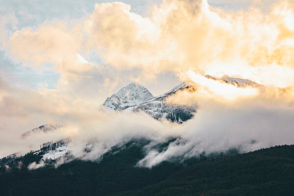 Evening clouds shrouding peaks of Aibga Ridge