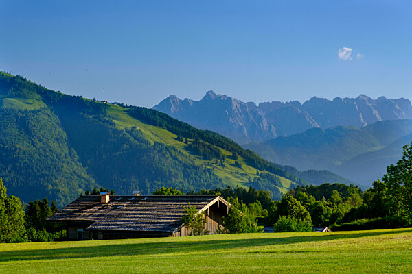 Germany, Bavaria, Reit im Winkl, Lone mountain hut in scenic Chiemgau Alps