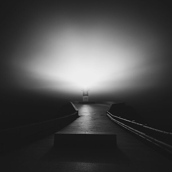 Spain, Province of A Coruna, Carino, Long exposure of Cape Ortegal Lighthouse at sunset