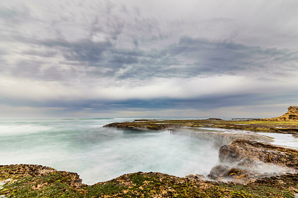 Cloudy sky over coastline of Portsea Surf Beach