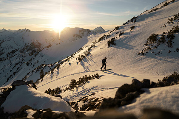Man walking on snowy mountain