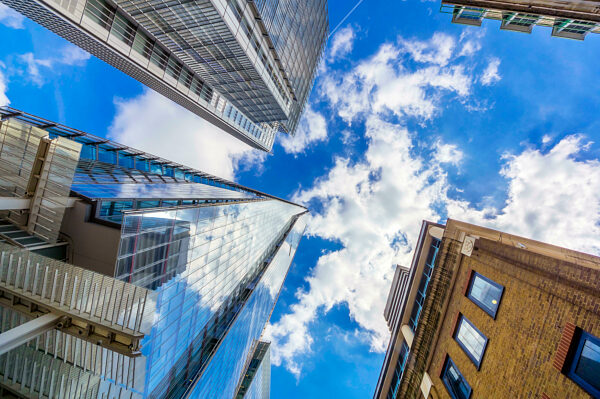 UK, England, London, Clouds over tall skyscrapers