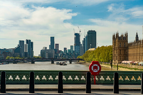 UK, England, London, Thames river with city skyline in background