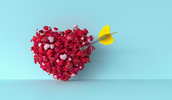 Dart piercing through bunch of hearts against blue background