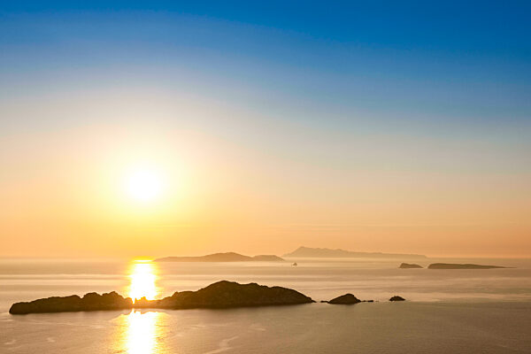 Greece, Ionian Islands, Sun setting over Nisida Kravi island