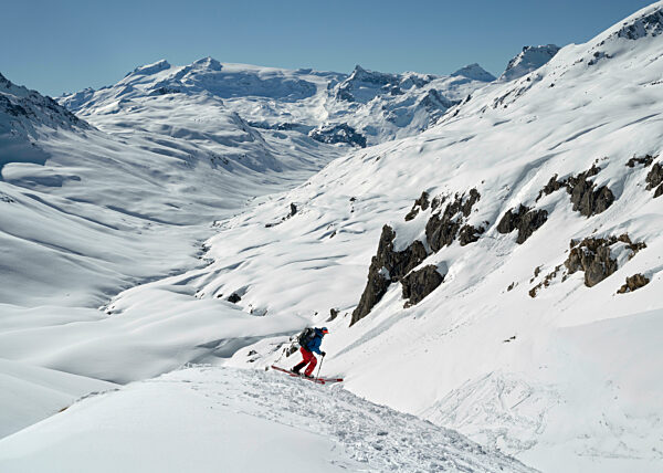 Skier skiing on Pointe de Mean Martin mountain in Vanoise National Park, France