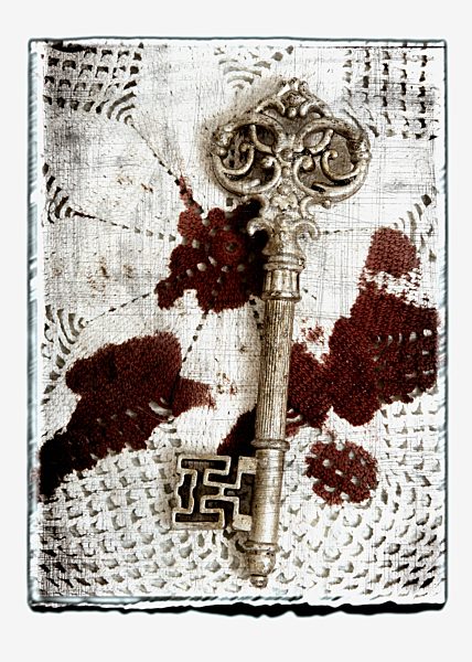 Collage of old key on blood stained cloth