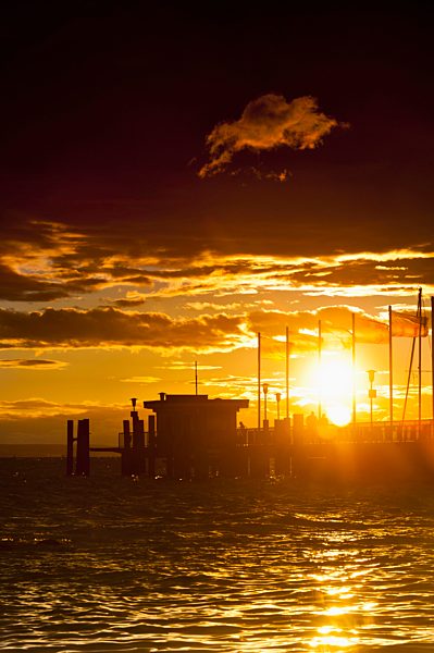 Germany, Nonnenhorn, View of jetty at sunset