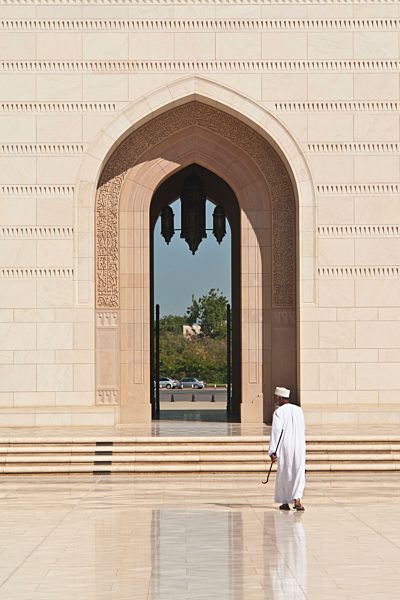 Oman, Worshipper at Sultan Qaboos Grand Mosque
