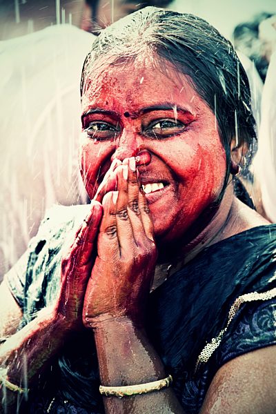 India, Ahmedabad, Young woman celebrates Holi festival
