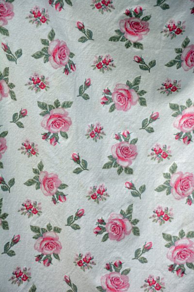 Fabric with pattern of roses