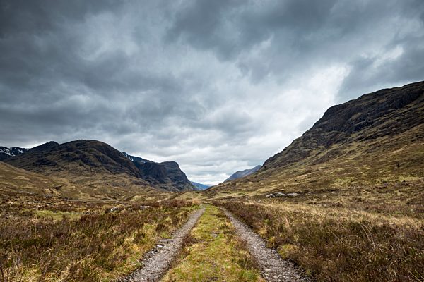United Kingdom, Scotland, View of rural road lead through Glen Coe