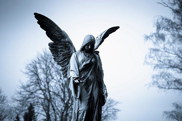Germany, Cologne, Statue of angel at Melatenfriedhof