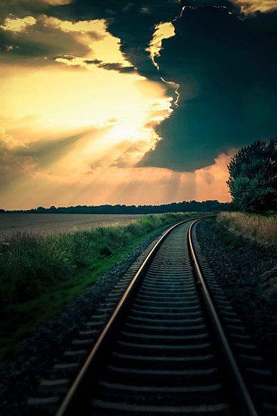 Germany, Saxony, View of railway track at dusk