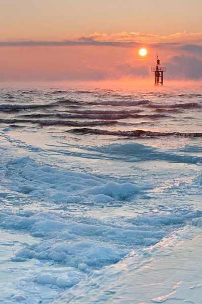 Germany, Constance, View of ice formation at shore and buoyage in steaming water