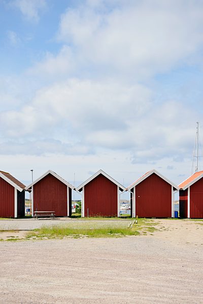 Sweden, Kungshamn, Row of typical red wooden houses