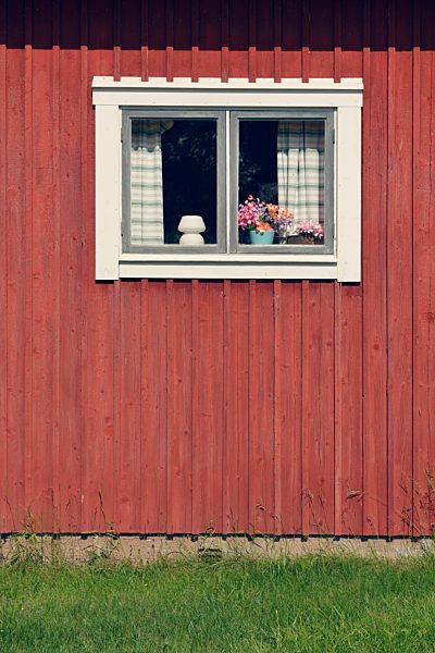 Sweden, Mora, Detail of a typical red wooden house