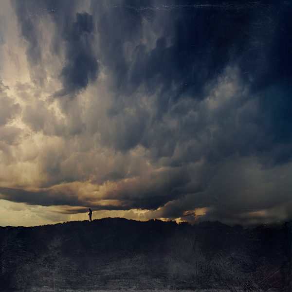France, Contis-Plage, One person on dune, Dark clouds, Textured effect