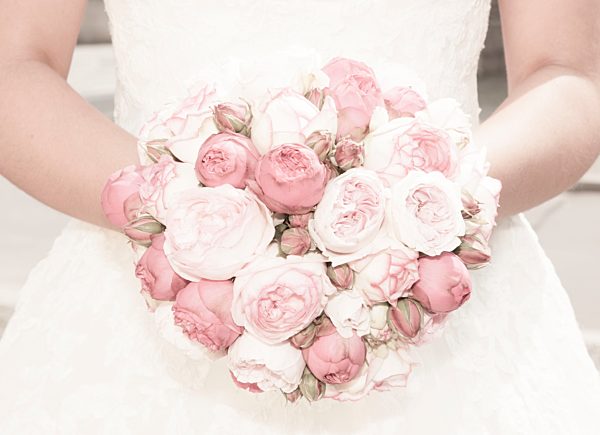 Germany, Bride holding bridal bouquet