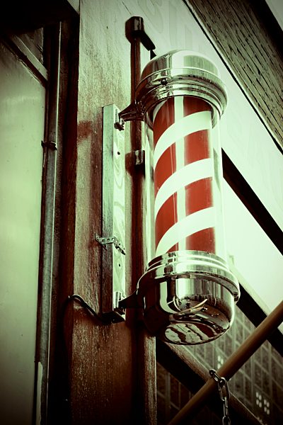 Netherlands, Amsterdam, view to typical barbershop sign