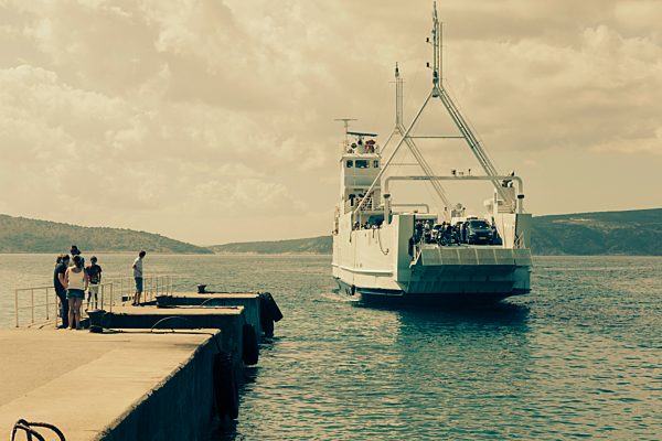 Croatia, Krk, Ferry at dock in Valbiska