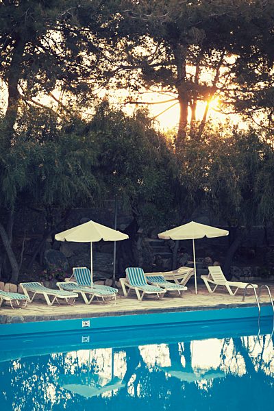 Greece, Crete, swimming pool and sun loungers