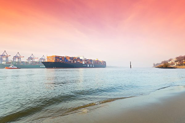 Germany, Hamburg, incoming Container ship MOL Quest, harbour, beach Oevelgoenne, in the morning