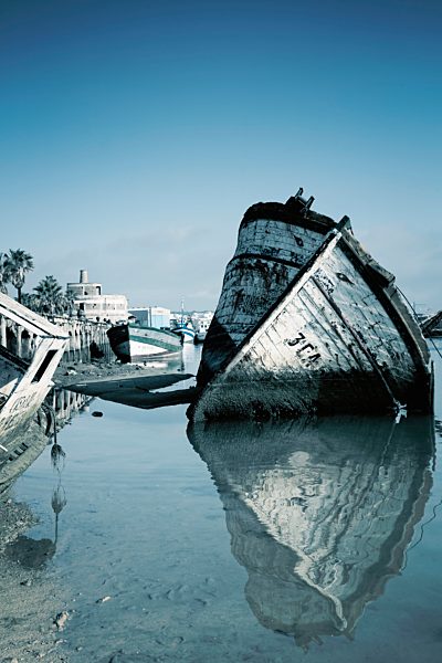Spain, Costa de la Luz, Barbate, Rotting boats in Rio Barbate river
