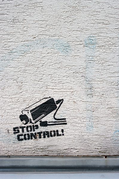 Stencilled graffito on house facade