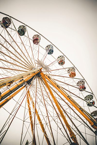 Part of big wheel in front of sky