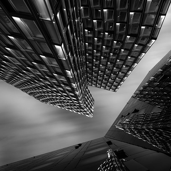Germany, Hamburg, Modern skyscrapers Dancing Towers in the evening