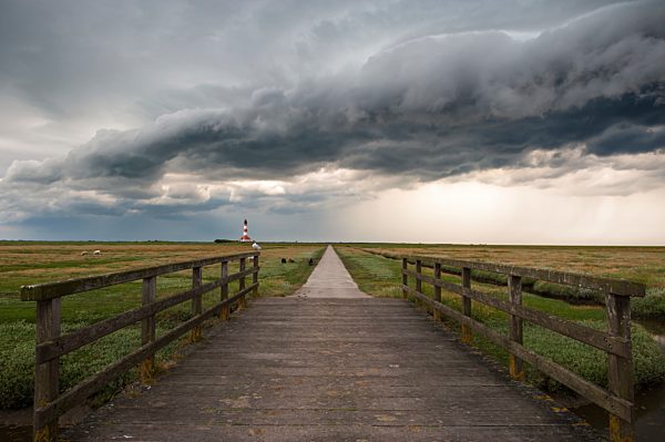 Germany, Schleswig-Holstein, North Sea, Thunderstorm over the Lighthouse Westerheversand